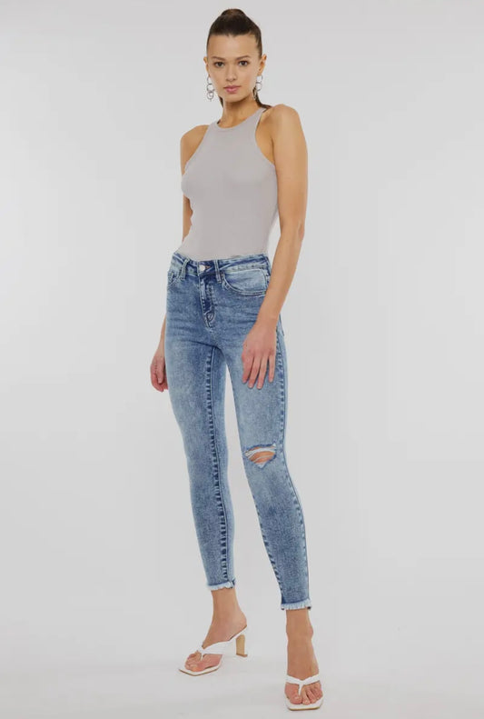 Light wash distressed skinny jean